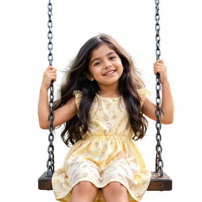 cute girl swinging in park with flowing hair