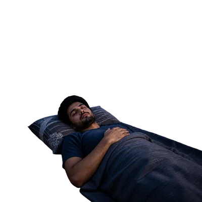 man sleeping on rooftop at night